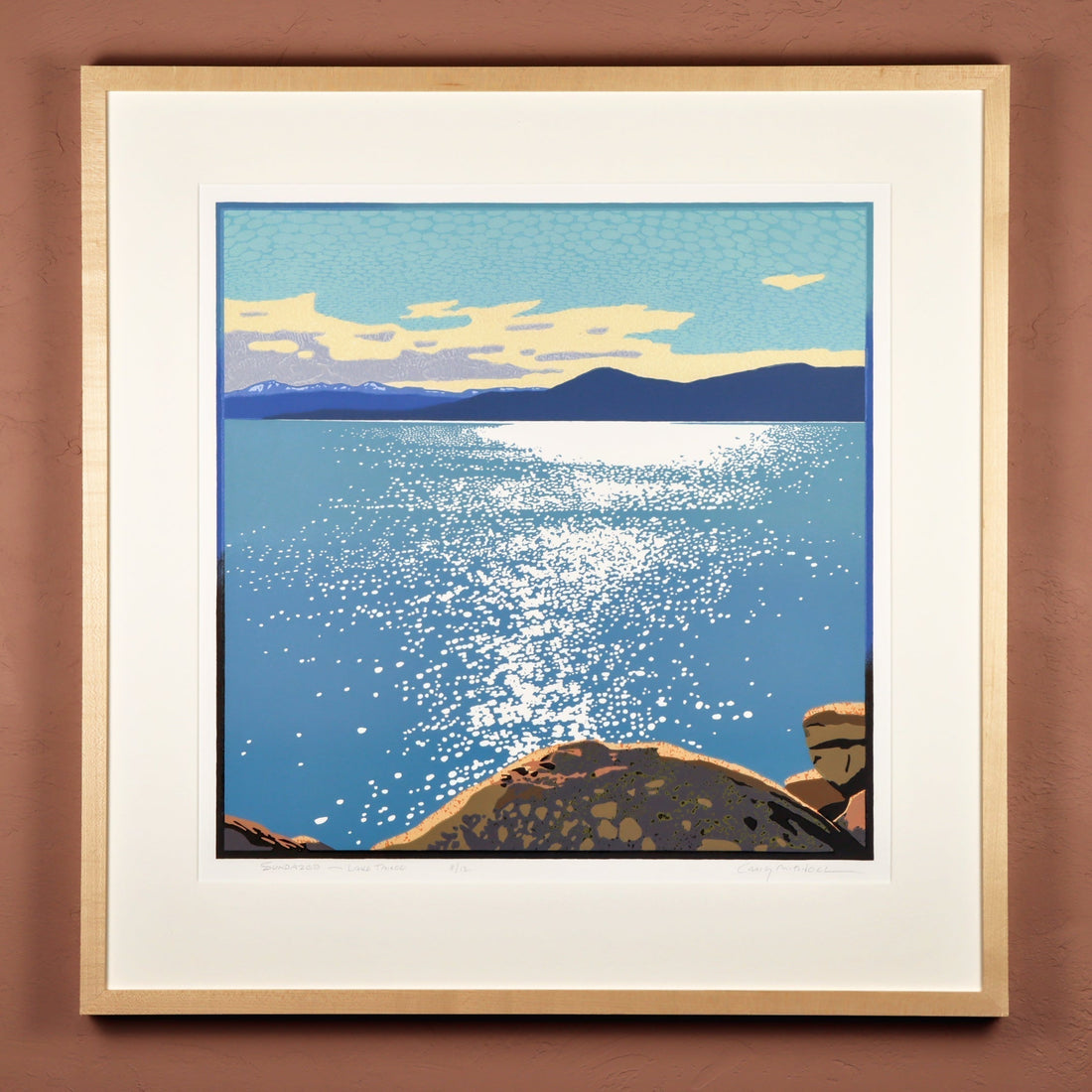 Original Lake Tahoe art shown on a wall.