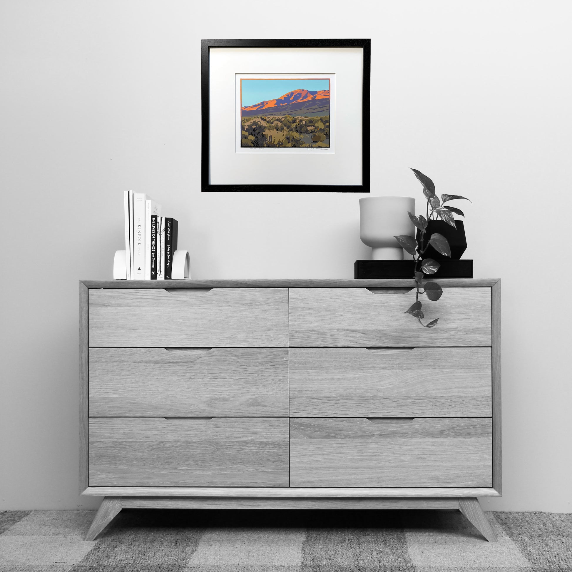 Artwork titled "Desert Finale" shown over dresser for scale
